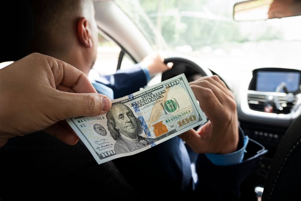How much should I tip my airport car service driver