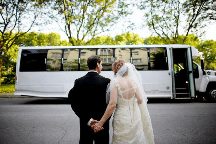 Charter bus rental at a wedding ceremony, offering transportation for guests.